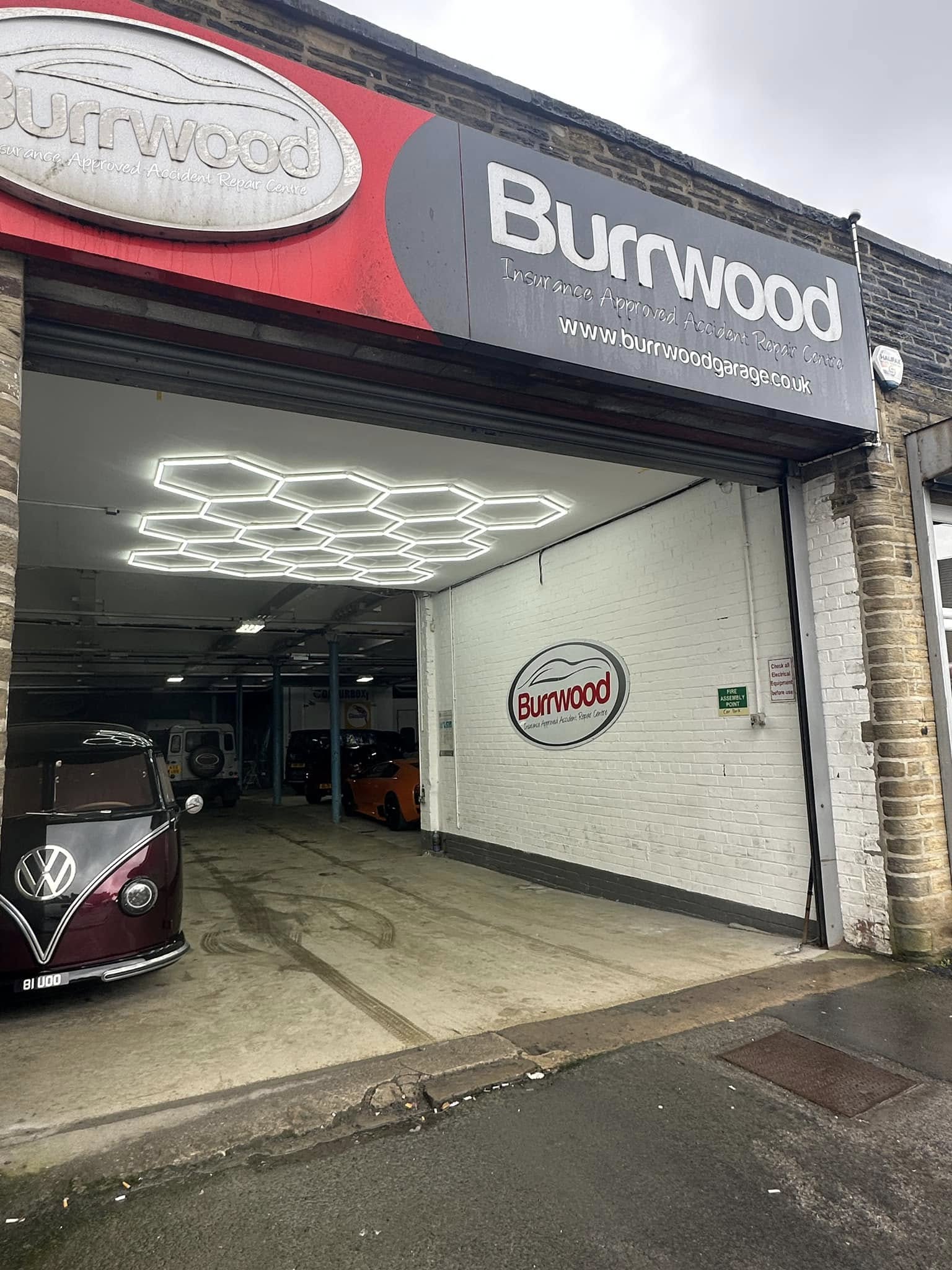 Honeycomb LED lighting installed in a commercial vehicle workshop entrance